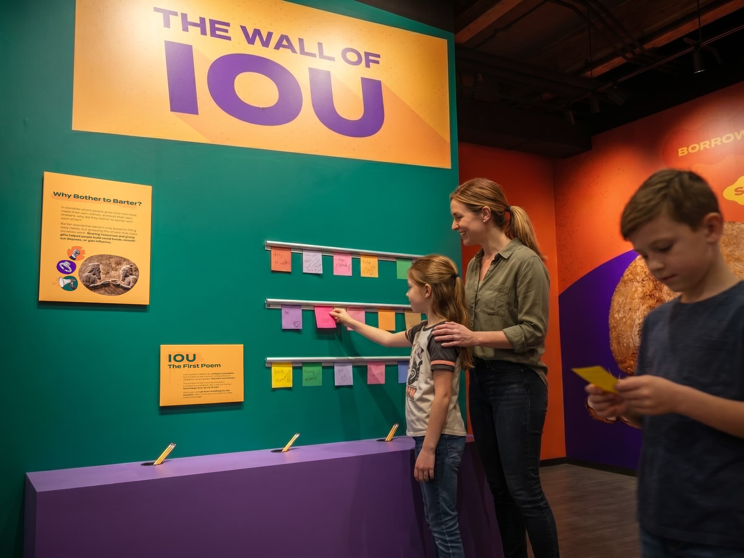 Mom and young daughter pin a handwritten note to MoMoney's Wall of IOUs while another student reads nearby.